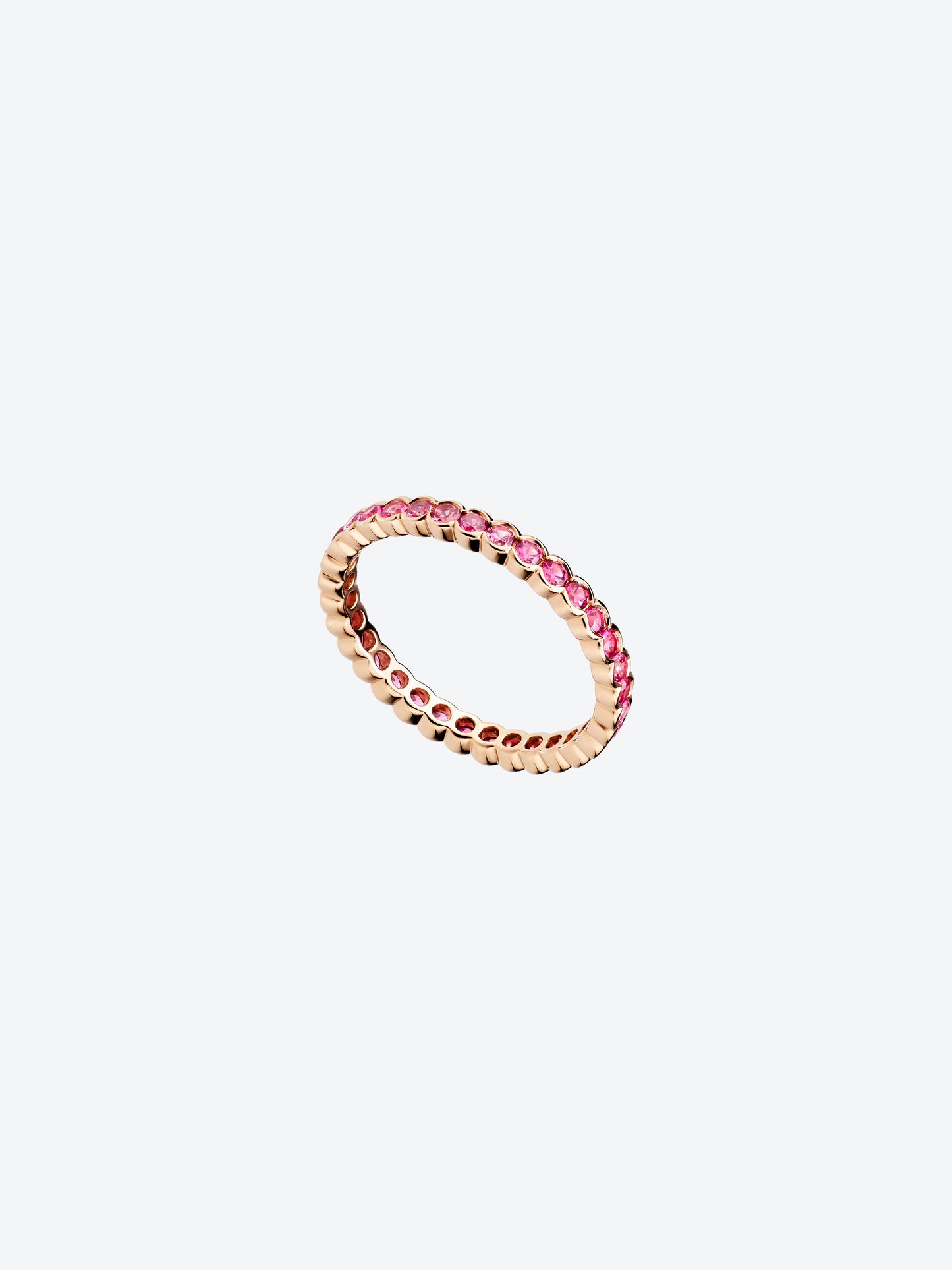 BAGUE FESTONNEE EN OR ROSE ET SPINELLES ROSES