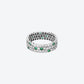 SCALLOPED WHITE GOLD, DIAMONDS AND EMERALDS RING